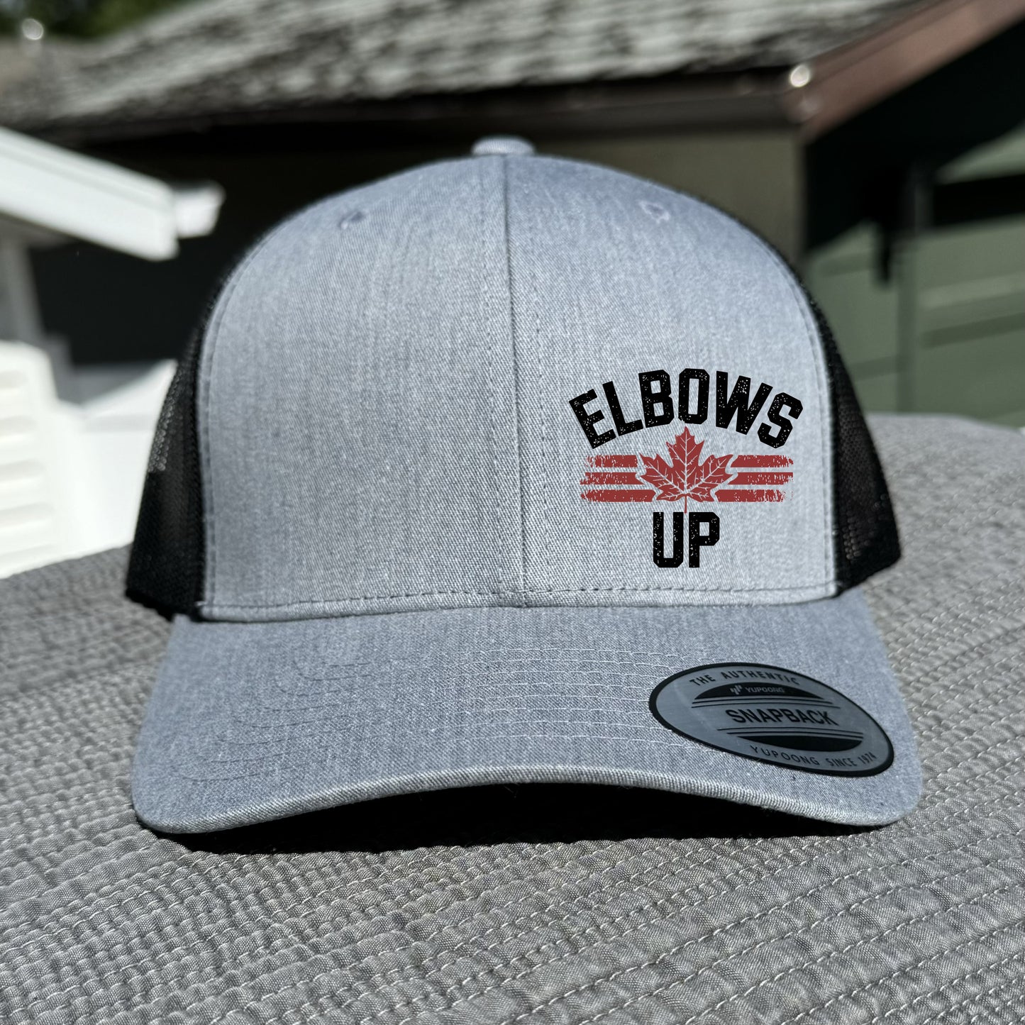 Elbows Up Trucker Hat