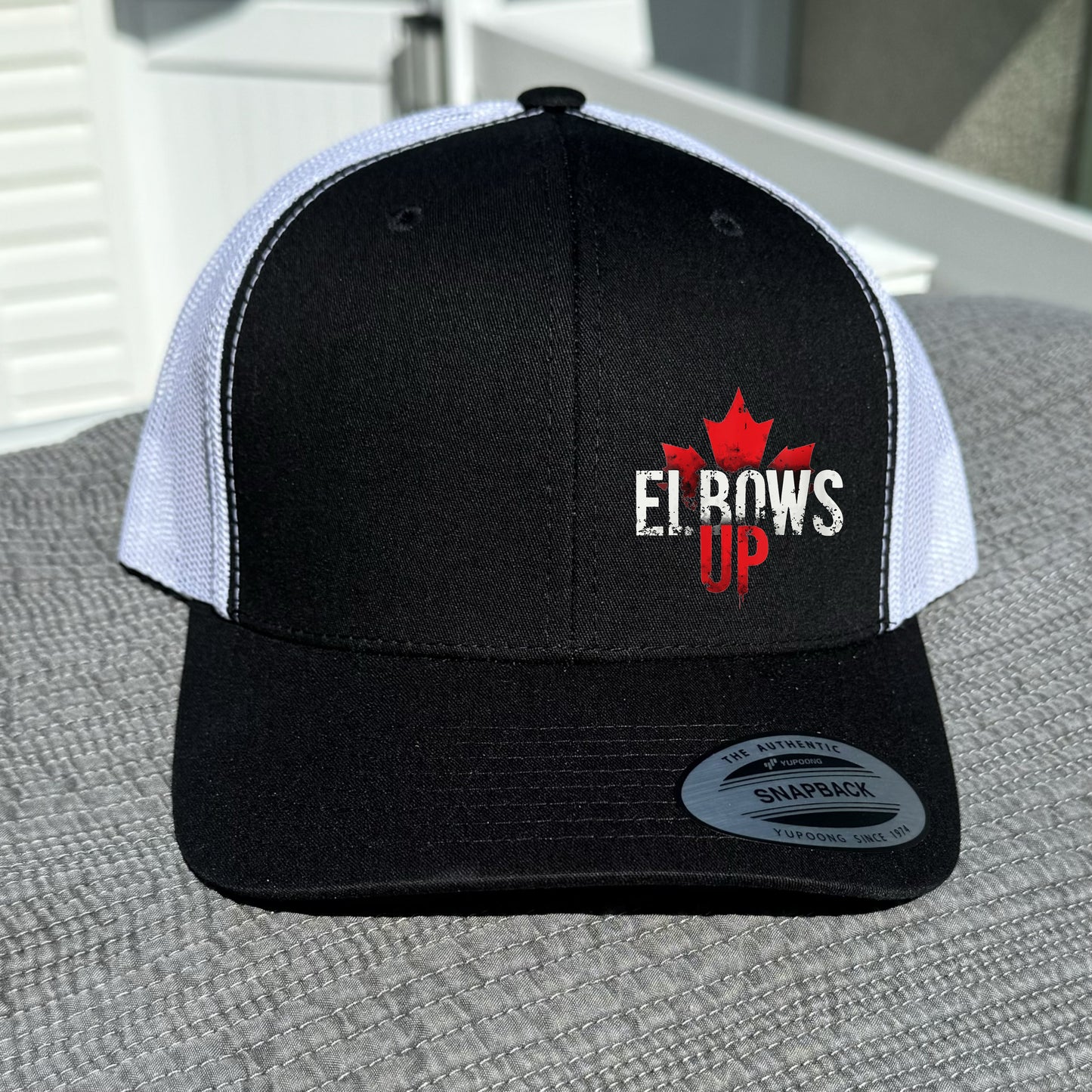 Elbows Up Trucker Hat